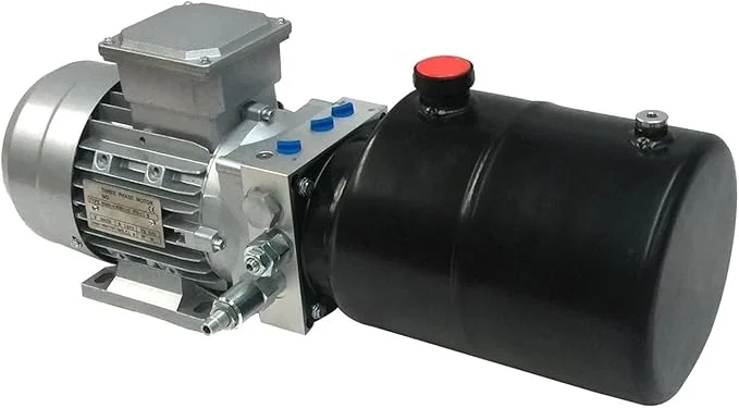 Industrial dock leveler hydraulic pump power unit with electric motor and black reservoir tank.
