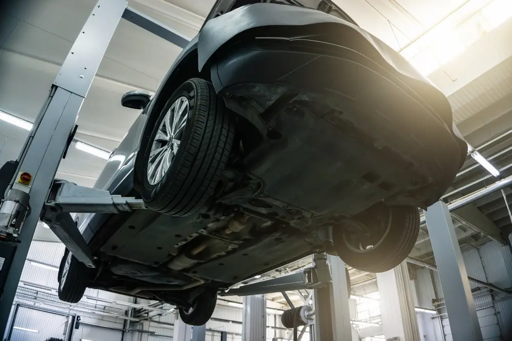 2 post lift power unit used for vehicle lifting in an automotive workshop