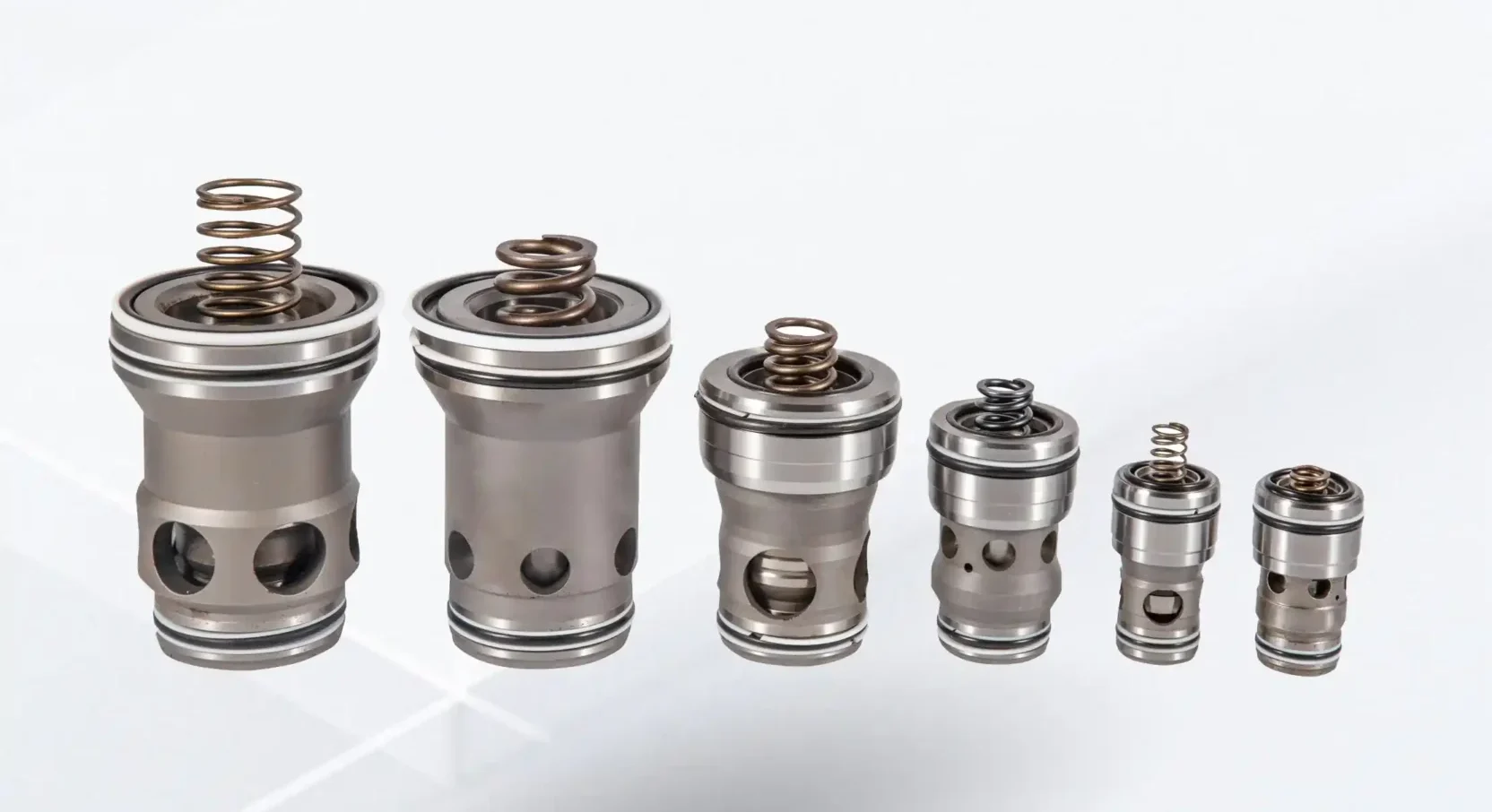 Logic cartridge valve series for hydraulic manifold systems